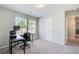 Office or bedroom with carpeted floors and natural light is a great flex space at 50 Crabapple Ridge Dr, Oxford, GA 30054