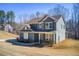 Well-maintained two-story home with a manicured lawn and mature trees in a desirable neighborhood at 50 Crabapple Ridge Dr, Oxford, GA 30054