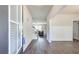 Spacious foyer with hardwood floors and view of staircase and living area at 50 Crabapple Ridge Dr, Oxford, GA 30054