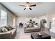 Open living room with a view of the modern kitchen at 50 Crabapple Ridge Dr, Oxford, GA 30054