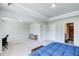 Spacious main bedroom with carpet, tray ceiling, and plenty of natural light at 50 Crabapple Ridge Dr, Oxford, GA 30054
