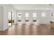 Living room with abundant windows and sliding doors at 528 Pearl St, Cumming, GA 30519