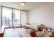 Bright living room with floor to ceiling windows offering expansive city views at 1080 Peachtree St # 2116, Atlanta, GA 30309