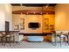 Cozy lounge area with comfortable seating, decorative shelving, and a sleek entertainment center at 1080 Peachtree St # 2116, Atlanta, GA 30309