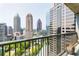 A stunning view of the city skyline from a high-rise balcony at 1080 Peachtree St # 2116, Atlanta, GA 30309