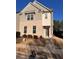 Charming two-story home featuring a brick facade, well-maintained landscaping, and a welcoming entrance at 1852 Laurel Green Way, East Point, GA 30344