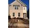 Charming two-story home featuring a brick facade, well-maintained landscaping, and a welcoming entrance at 1852 Laurel Green Way, East Point, GA 30344