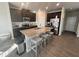 Well-equipped kitchen featuring a granite island with seating, stainless steel appliances, and ample cabinet space at 1852 Laurel Green Way, East Point, GA 30344