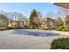 Community pool with a protective cover and a charming gazebo in the background at 302 Gladstone Dr, Mcdonough, GA 30253