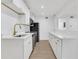 Modern kitchen features white cabinets, stainless steel appliances, and sleek countertops at 2396 Lawrenceville Hwy # V, Decatur, GA 30033