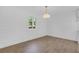Bright living room features wood flooring, recessed lighting, a window, and panel moulding at 2396 Lawrenceville Hwy # V, Decatur, GA 30033