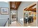 Inviting foyer showcasing wood floors, skylights, and an open view to the kitchen and dining area at 6275 Hunting Creek Rd, Atlanta, GA 30328
