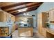 Modern kitchen boasts stainless steel appliances, granite countertops, and ample cabinet space at 6275 Hunting Creek Rd, Atlanta, GA 30328