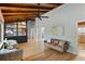 Spacious living room with wood floors, comfortable seating, and plenty of natural light at 6275 Hunting Creek Rd, Atlanta, GA 30328