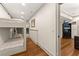 Cozy bunk room with built-in bunk beds and neutral decor at 7565 Heard Rd, Cumming, GA 30041