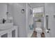 Bright bathroom featuring a modern vessel sink, sleek fixtures, and a shower with decorative curtain at 1630 Sylvan Sw Rd, Atlanta, GA 30310