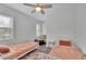 Bright bedroom featuring two beds and colorful rug at 1630 Sylvan Sw Rd, Atlanta, GA 30310