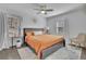Bright primary bedroom with natural lighting, ceiling fan and neutral colors at 1630 Sylvan Sw Rd, Atlanta, GA 30310