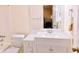 Bright bathroom with a white vanity, sink and storage space at 566 Sugar Valley Lane, Conyers, GA 30094