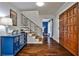 Inviting foyer with hardwood floors, wooden door and an elegant staircase at 571 Tahoe Cir, Stone Mountain, GA 30083