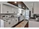 Modern kitchen with granite countertops and stainless steel appliances at 571 Tahoe Cir, Stone Mountain, GA 30083