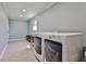 Spacious laundry room with modern washer and dryer units and ample room for folding at 571 Tahoe Cir, Stone Mountain, GA 30083