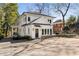 Newly renovated home featuring white exterior, black trim and a well-maintained landscape at 818 Springdale Ne Rd, Atlanta, GA 30306