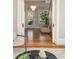 Elegant foyer with herringbone floors viewed from the living room at 818 Springdale Ne Rd, Atlanta, GA 30306