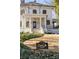 Two-story home with a columned front porch located in the historic Druid Hills neighborhood at 818 Springdale Ne Rd, Atlanta, GA 30306