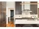 Modern kitchen with stainless steel appliances, white countertops, and dark wood cabinets at 818 Springdale Ne Rd, Atlanta, GA 30306