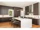 Modern kitchen with stainless steel appliances, white countertops, and hardwood floors at 818 Springdale Ne Rd, Atlanta, GA 30306