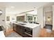 Open concept kitchen with stainless steel appliances and breakfast bar at 818 Springdale Ne Rd, Atlanta, GA 30306