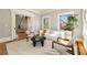 Open living room showcasing elegant trim, large windows, and seamless flow at 818 Springdale Ne Rd, Atlanta, GA 30306