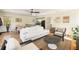 Living room featuring hardwood floors, a modern couch, and neutral tones at 818 Springdale Ne Rd, Atlanta, GA 30306