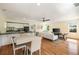 Open living room with dining area, hardwood floors and natural light at 818 Springdale Ne Rd, Atlanta, GA 30306