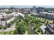 Scenic view of a pond with a modern walking path and buildings in the background at 818 Springdale Ne Rd, Atlanta, GA 30306