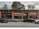 Charming restaurant exterior with brick accents, inviting ambiance, and outdoor seating at 818 Springdale Ne Rd, Atlanta, GA 30306