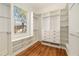 Custom walk-in closet with built-in shelving and drawers for optimal organization at 818 Springdale Ne Rd, Atlanta, GA 30306