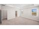 Large bedroom with an ensuite bathroom and several large windows at 1246 Allspice Way, Lawrenceville, GA 30045