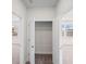 Hallway features an open closet with shelving, providing ample storage space at 1246 Allspice Way, Lawrenceville, GA 30045