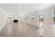 Bright and airy living room with a fireplace, large windows, and a door to the backyard at 1246 Allspice Way, Lawrenceville, GA 30045