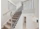 Carpeted staircase with decorative wrought iron railing at 1246 Allspice Way, Lawrenceville, GA 30045