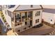 An aerial view of the back of the property with a patio, landscaped yard, and balcony at 260 Hemphill Ln, Marietta, GA 30064