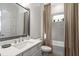 Stylish bathroom featuring neutral finishes, a large vanity with modern fixtures, and a shower/tub combination at 260 Hemphill Ln, Marietta, GA 30064
