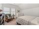Serene bedroom with a crib, comfortable chair, and plenty of natural light from the windows at 260 Hemphill Ln, Marietta, GA 30064