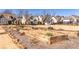 View of raised garden beds with a selection of homes in the community in the background at 260 Hemphill Ln, Marietta, GA 30064