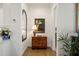 Inviting hallway with hardwood floors, complemented by a decorative mirror and antique chest at 260 Hemphill Ln, Marietta, GA 30064