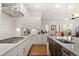 Well-lit kitchen featuring white cabinets, stainless steel appliances, and an open design at 260 Hemphill Ln, Marietta, GA 30064