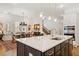 Bright kitchen featuring a large island, stainless steel appliances, and an adjacent dining area with natural light at 260 Hemphill Ln, Marietta, GA 30064