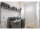 Well-equipped laundry room featuring a modern washer and dryer set for efficient laundry tasks at 260 Hemphill Ln, Marietta, GA 30064